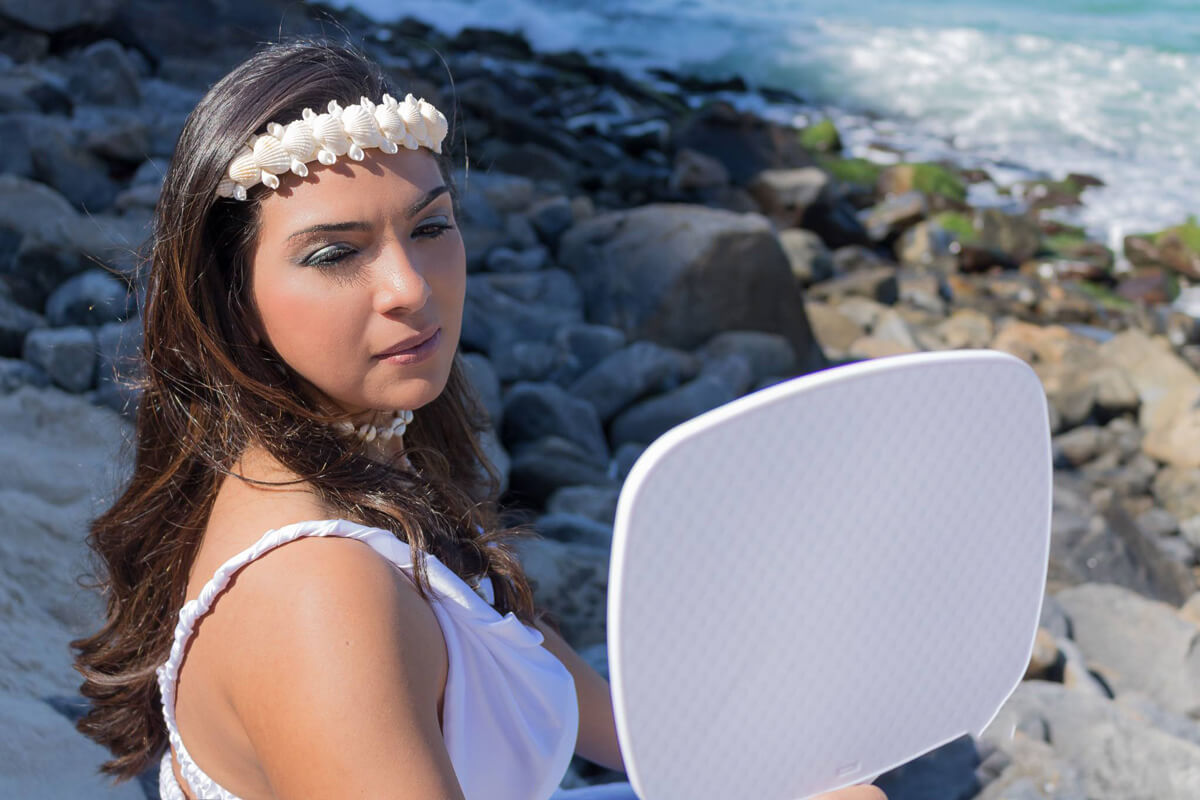 Book feminino externo na praia